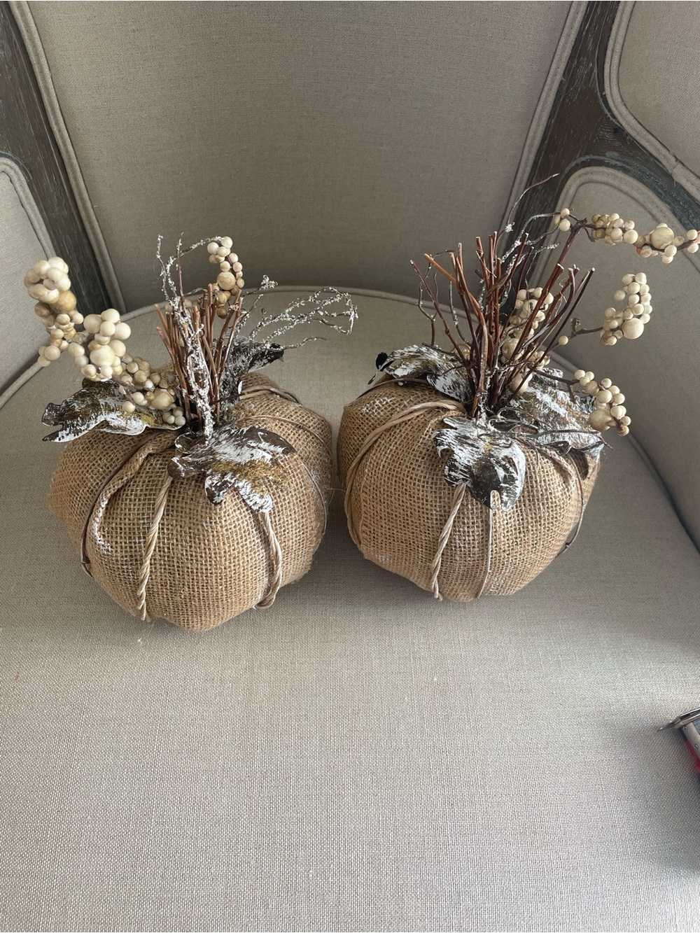 Two burlap decorative pumpkins